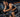 Indoor spin bike workout highlighting core engagement and abdominal posture during cycling
