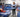 Gymnastics training center with flooring, coaching space, and essential support equipment