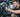 Leg extension machine cam system illustrating how resistance curves change through the range of motion