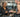 Commercial treadmill running belt and deck in a high-traffic gym cardio area