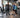 Older adults using a senior-friendly strength machine circuit in a modern commercial gym