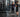 Busy commercial strength training area designed for heavy student traffic with racks, storage, and durable flooring
