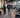 Employees using cardio and strength equipment in a modern corporate wellness center