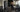 High-traffic apartment fitness center with commercial cardio, strength equipment, dumbbells, storage, and durable flooring