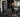 High-traffic apartment fitness center with commercial cardio, strength equipment, dumbbells, storage, and durable flooring