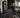 High-traffic apartment fitness center with commercial cardio, strength equipment, dumbbells, storage, and durable flooring