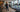 Modern hotel fitness center with commercial cardio, strength equipment, dumbbells, and open training space