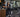 Boutique fitness studio owner evaluating commercial gym equipment and training floor layout