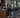 Boutique fitness studio owner evaluating commercial gym equipment and training floor layout