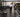 Clean firehouse or police department fitness room with commercial strength equipment, functional training space, and durable gym flooring