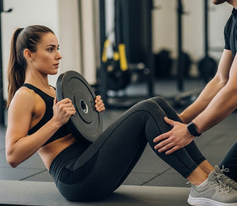 How to hold a weight plate during sit ups for core training