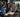 Residents with different fitness experience levels using cardio, strength, and free-weight equipment in a well-planned residential fitness center