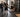 Busy gym strength area designed to reduce noise from dropped weights with protective flooring and organized free-weight zones
