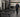 Commercial strength training floor with adjustable benches, free weights, and organized equipment for gym facility planning