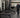 Commercial strength training floor with adjustable benches, free weights, and organized equipment for gym facility planning