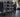 Organized functional training area with battle ropes, sleds, resistance bands, and medicine balls stored efficiently