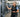 Beginner using a cable machine for strength training exercises in a modern gym