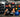 Slam balls, wall balls, and vinyl medicine balls arranged in a functional training gym