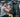 Athlete using a rope pull machine for back and arms workout