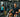 Gym machines lineup showing treadmills, cable machines, benches, and weight racks