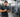 Technician cleaning and lightly lubricating guide rods on a selectorized strength machine