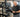 AI-assisted safety monitoring in a modern free weight area with racks, dumbbells, and lifting platforms