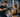 Machine-based back and shoulder workout routine in a commercial gym setting