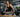 Trap bar strength training setup demonstrating versatile deadlift positioning in a modern gym