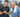 Senior living fitness facility with older adults using cardio and wellness equipment