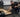 Deadlift platform in a strength training area with barbell and plates