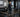 Employees training independently in a modern gym with guided strength and cardio equipment