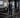 Employees training independently in a modern gym with guided strength and cardio equipment