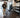 Gym owner reviewing beginner equipment zones with strength, cardio, benches, racks, and free weights
