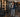 Modern hotel fitness room with commercial cardio, strength equipment, and organized workout space