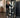 Athlete using an adjustable leg extension machine designed to accommodate different body types