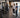 Employee walking through a modern workplace gym with commercial strength and cardio equipment