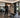 Hotel fitness center strength equipment beyond dumbbells with benches, cables, and commercial training options