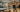 Comparison of wall-mounted, free-standing, and floor-based barre installations in a modern fitness studio