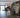 Commercial gym equipment arranged in a low-ceiling training space with careful clearance planning