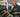 RFID tracking technology used on organized dumbbell racks in a modern gym strength training area