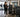 Hotel fitness center with simple commercial machines and clear equipment instructions for guests