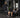 Gym member using self-spotting strength equipment in a modern low-staff fitness facility