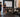 Residential gym with simple strength equipment, organized storage, and open training space