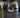 Athletes training with sleds, power racks, lifting platforms, and cable stations in a performance gym