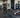 Modern commercial gym stretching area with open floor space, exercise mats, mobility accessories, and organized storage
